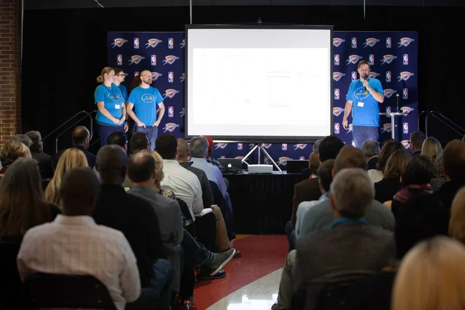 Dale presenting Seed to Spoon to the seated audience at Thunder Launchpad Demo Day.